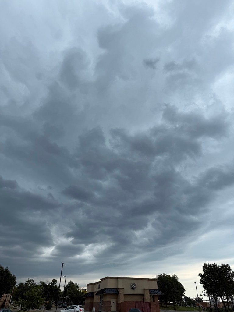Dark turbulent cloud deck over Shawnee Mission, Kansas at 2:27 PM on September 9, 2026.