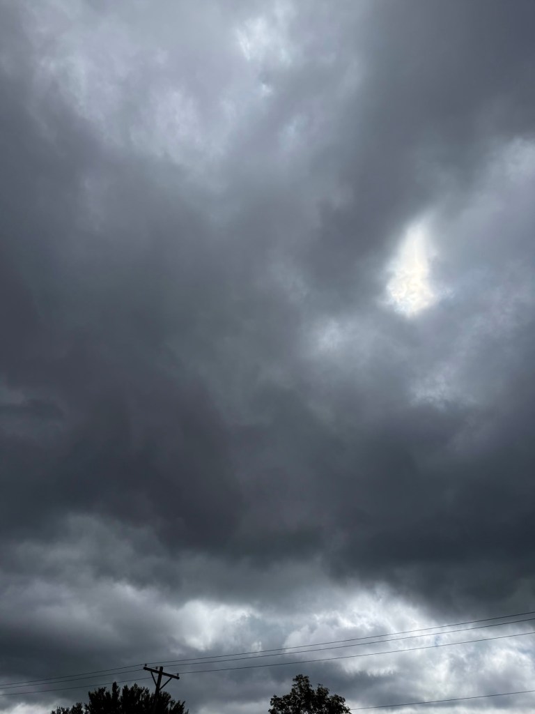 Dark gray clouds overhead between Raytown and Independence, Missouri
