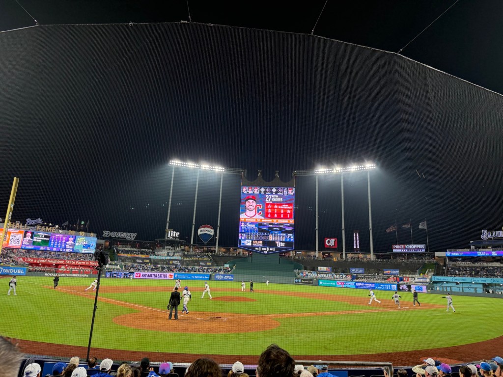 Kansas City Royals game at Kauffman Stadium beneath the dark night sky and stadium lights