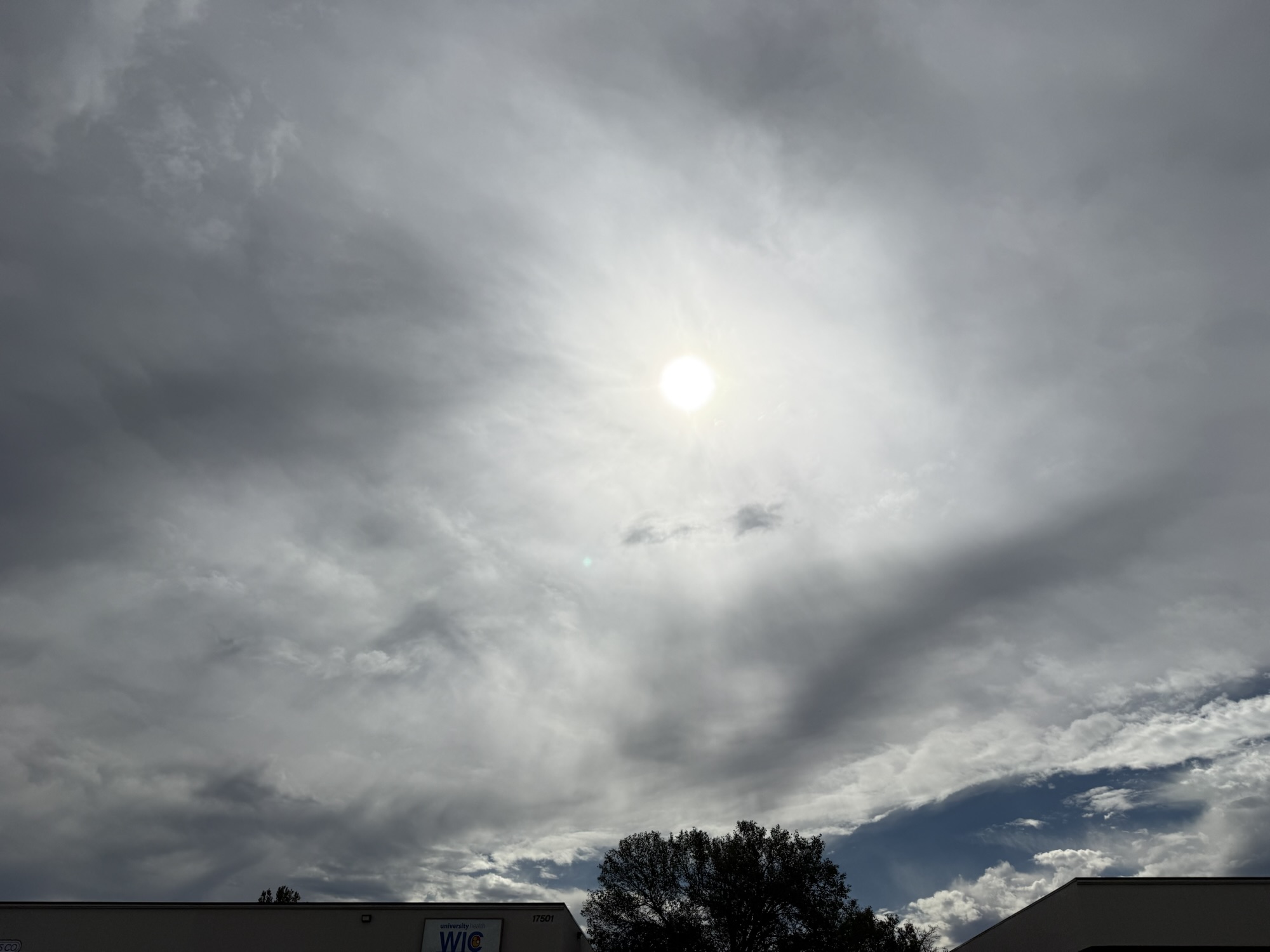 1:11 PM, Independence: sunlight shining through thin cloud.