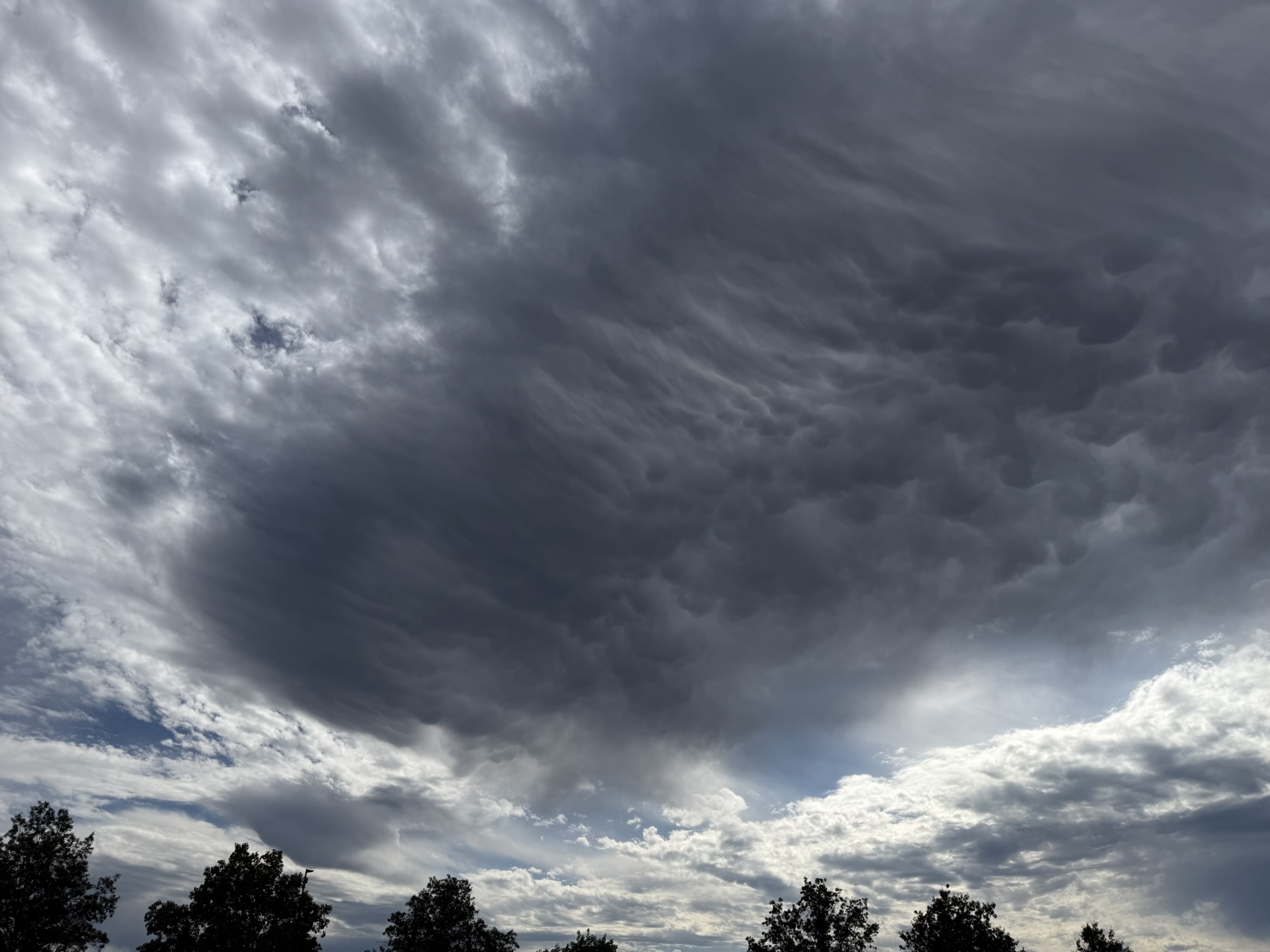 1:41 PM, Independence: dramatic textured cloud base with possible mammatus features.
